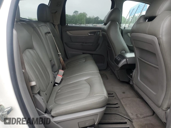 2014 Chevrolet Traverse LS z VIN 1GNKRFED5EJ340184, wystawiony jako Copart lot #54798975 z przebiegiem 197 728 mil mil oraz Czysty tytuł • Clean title. Historia ofert i sprzedaży dostępna na DreamBid. Obrazek 11.