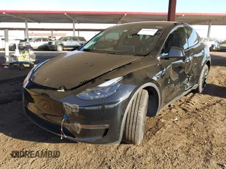 2023 Tesla Model Y Long Range with VIN 7SAYGDEE8PF815622, listed as a IAAI auction lot 41515433 with 70,862 mi miles and . Bid and sale history available at DreamBid. Image 17.