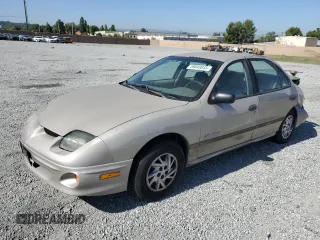 2002 Pontiac Sunfire SE z VIN 1G2JB524227409529, wystawiony jako Copart lot #59048045 z przebiegiem 89 377 mil mil oraz Szkoda całkowita • Salvage title. Historia ofert i sprzedaży dostępna na DreamBid. Obrazek 1.