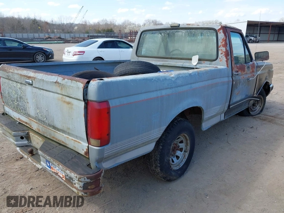 1991 Ford F-150 with VIN 1FTDF15Y2MNA84402, listed as a IAAI auction lot 41788034 with 1 mi miles. Bid and sale history available at carsss.com. Image 4.