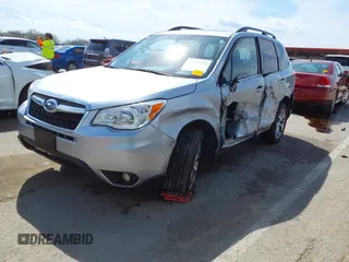 2016 Subaru Forester 2.5i Touring with VIN JF2SJAVC8GH493549, listed as a IAAI auction lot 41875775 with 74,767 mi miles. Bid and sale history available at carsss.com. Image 2.