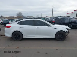 2017 Kia Optima LX with VIN 5XXGT4L32HG171992, listed as a IAAI auction lot 41477494 with 119,415 mi miles. Bid and sale history available at carsss.com. Image 12.