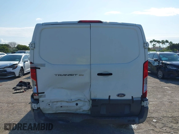 2015 Ford Transit Cargo with VIN 1FTNE1ZM0FKA90248, listed as a IAAI auction lot 41995824 with 157,085 mi miles. Bid and sale history available at carsss.com. Image 16.