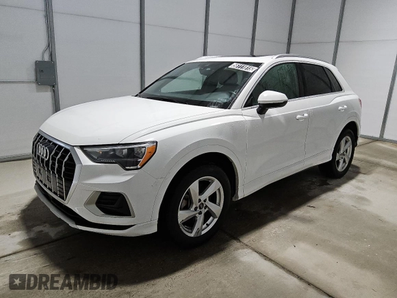 2021 Audi Q3 Premium with VIN WA1AUCF34M1090677, listed as a Copart auction lot 56111815 with 93,573 mi miles and Clean title. Bid and sale history available at DreamBid. Image 1.