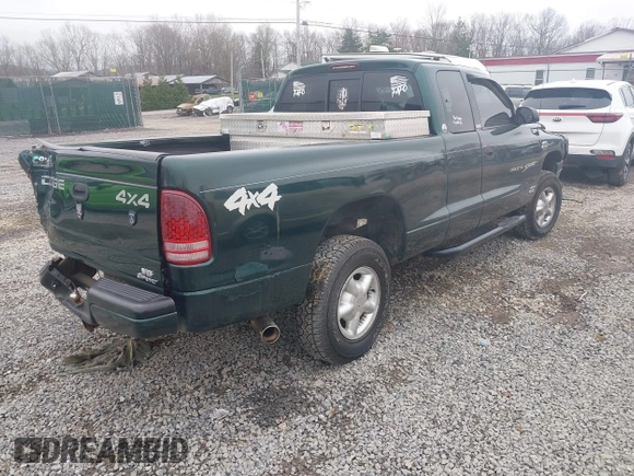 2000 Dodge Dakota SLT with VIN 1B7GG22X3YS508480, listed as a IAAI auction lot 41900645 with 105,652 mi miles and . Bid and sale history available at carsss.com. Image 4.