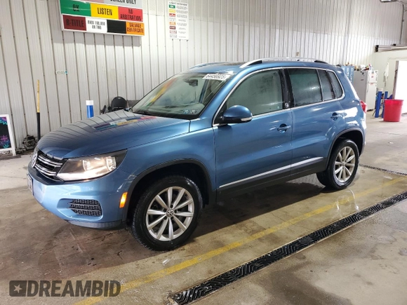 2017 Volkswagen Tiguan Wolfsburg Edition with VIN WVGSV7AX1HK014774, listed as a Copart auction lot 64456925 with 91,999 mi miles and Salvage title. Bid and sale history available at DreamBid. Image 1.