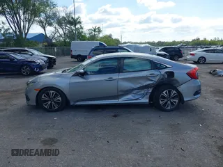 2017 Honda Civic EX-T with VIN 19XFC1F39HE001756, listed as a IAAI auction lot 42030331 with 44,056 mi miles. Bid and sale history available at carsss.com. Image 14.