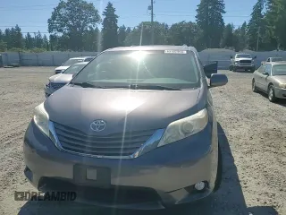 2015 Toyota Sienna XLE with VIN 5TDYK3DC7FS630252, listed as a Copart auction lot 65182965 with 90,764 mi miles and Salvage title. Bid and sale history available at DreamBid. Image 14.