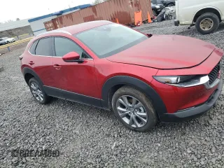 2023 Mazda CX-30 S Carbon Edition with VIN 3MVDMBCM3PM521753, listed as a Copart auction lot 85994464 with 10,327 mi miles and Salvage title. Bid and sale history available at DreamBid. Image 4.