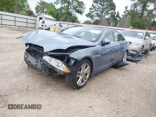 2013 Jaguar XJ with VIN SAJWA2G17DLV57561, listed as a IAAI auction lot 41928575 with 108,794 mi miles. Bid and sale history available at carsss.com. Image 18.