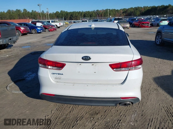 2016 Kia Optima LX with VIN 5XXGT4L36GG005859, listed as a IAAI auction lot 41053277 with 127,783 mi miles. Bid and sale history available at carsss.com. Image 16.