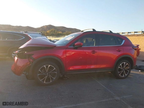 2022 Mazda CX-5 2.5 S Premium Package with VIN JM3KFBDM6N0638428, listed as a IAAI auction lot 41112552 with NaN miles. Bid and sale history available at carsss.com. Image 14.