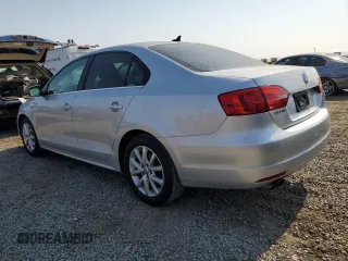 2014 Volkswagen Jetta SE с VIN 3VWD17AJ9EM437088, выставлен на аукционе Copart как лот 64810275 с пробегом 92 165 миль миль и Списание • Salvage title. История ставок и продаж доступна на DreamBid. Изображение 2.