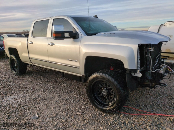 2015 Chevrolet Silverado 3500HD LTZ with VIN 1GC4K0E82FF634054, listed as a Copart auction lot 85249714 with 121,703 mi miles and Salvage Title. Bid and sale history available at carsss.com. Image 4.