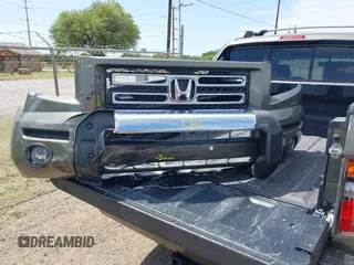 2007 Honda Ridgeline RTL with VIN 2HJYK16577H537990, listed as a IAAI auction lot 42454619 with 182,911 mi miles and . Bid and sale history available at DreamBid. Image 12.