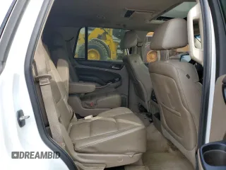 2015 Chevrolet Tahoe LTZ with VIN 1GNSKCKC1FR310018, listed as a Copart auction lot 71798454 with 244,179 mi miles and Salvage title. Bid and sale history available at DreamBid. Image 11.