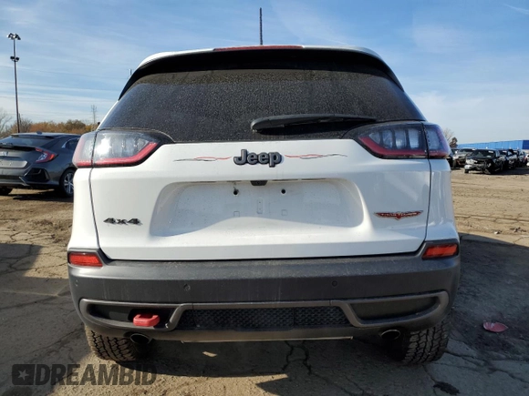 2022 Jeep Cherokee Trailhawk with VIN 1C4PJMBX3ND505107, listed as a Copart auction lot 77418384 with 12,952 mi miles and Clean Title. Bid and sale history available at carsss.com. Image 6.