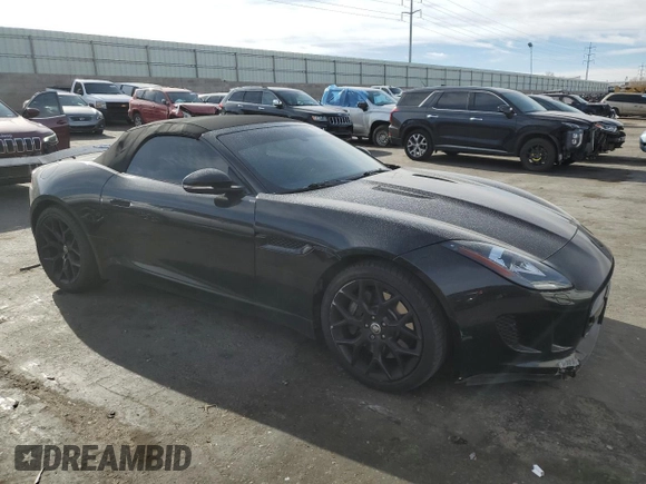 2014 Jaguar F-Type V6 with VIN SAJWA6E7XE8K09479, listed as a Copart auction lot 49477115 with 93,755 mi miles and Salvage Title. Bid and sale history available at DreamBid. Image 4.