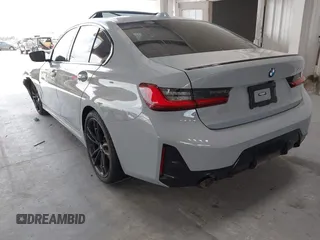2023 BMW 3 Series 330i with VIN 3MW69FF01P8D33427, listed as a IAAI auction lot 42461734 with 15,587 mi miles and . Bid and sale history available at DreamBid. Image 3.