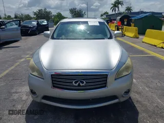 2014 Infiniti Q70 Luxe z VIN JN1BY1AP5EM260464, wystawiony jako IAAI lot #42372872 z przebiegiem 116 756 mil mil oraz . Historia ofert i sprzedaży dostępna na DreamBid. Obrazek 12.