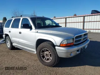 2002 Dodge Durango SLT z VIN 1B4HS48N72F156327, wystawiony jako IAAI lot #41745543 z przebiegiem 166 354 mil mil oraz . Historia ofert i sprzedaży dostępna na DreamBid. Obrazek 1.