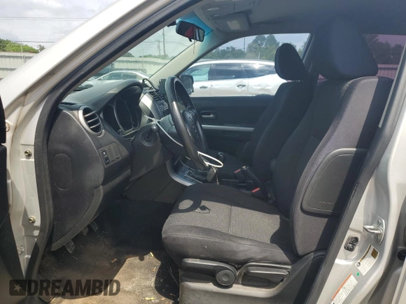 2006 Suzuki Grand Vitara z VIN JS3TE941764101657, wystawiony jako Copart lot #54943205 z przebiegiem 206 744 mil mil oraz Szkody całkowita. Historia ofert i sprzedaży dostępna na DreamBid. Obrazek 7.