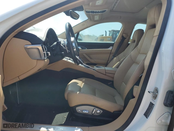 2016 Porsche Panamera 4 with VIN WP0AA2A79GL000127, listed as a Copart auction lot 56220614 with 76,065 mi miles and Salvage Title. Bid and sale history available at carsss.com. Image 7.