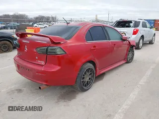 2016 Mitsubishi Lancer GT with VIN JA32U8FW1GU012988, listed as a IAAI auction lot 41498905 with 94,727 mi miles. Bid and sale history available at carsss.com. Image 4.