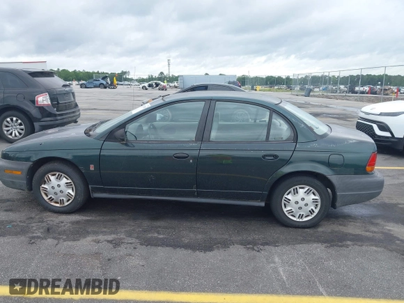 1998 Saturn SL с VIN 1G8ZH5280WZ295857, выставлен на аукционе IAAI как лот 42238789 с пробегом 153 163 миль миль и . История ставок и продаж доступна на DreamBid. Изображение 14.