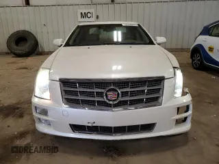 2010 Cadillac STS AWD z VIN 1G6DU6EV0A0106434, wystawiony jako Copart lot #52439915 z przebiegiem 90 187 mil mil oraz Czysty tytuł • Clean title. Historia ofert i sprzedaży dostępna na DreamBid. Obrazek 5.
