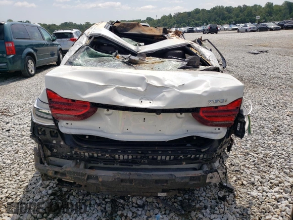 2018 BMW 7 Series 750i with VIN WBA7F0C55JGM23022, listed as a Copart auction lot 63495573 with 0 mi miles and Salvage Title. Bid and sale history available at carsss.com. Image 6.