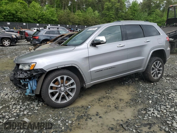 2018 Jeep Grand Cherokee Overland z VIN 1C4RJFCTXJC108624, wystawiony jako Copart lot #53738094 z przebiegiem 83 040 mil mil oraz . Historia ofert i sprzedaży dostępna na DreamBid. Obrazek 1.