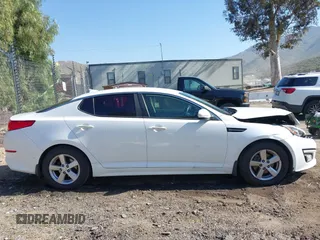 2015 Kia Optima LX with VIN 5XXGM4A76FG456677, listed as a IAAI auction lot 41976831 with 138,008 mi miles. Bid and sale history available at carsss.com. Image 13.