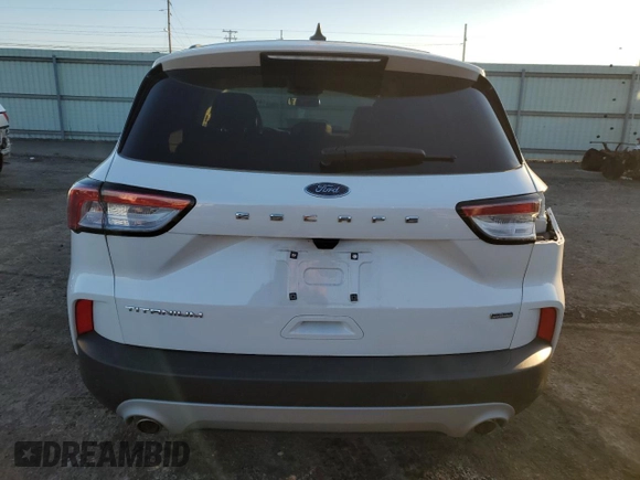 2022 Ford Escape Titanium Plug-In Hybrid с VIN 1FMCU0LZ5NUA57513, выставлен на аукционе Copart как лот 41634475 с пробегом 52 542 миль миль и Списание • Salvage title. История ставок и продаж доступна на DreamBid. Изображение 6.