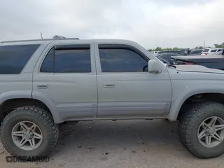 1998 Toyota 4Runner Limited with VIN JT3HN87R7W0184602, listed as a IAAI auction lot 41942100 with 272,823 mi miles. Bid and sale history available at carsss.com. Image 12.
