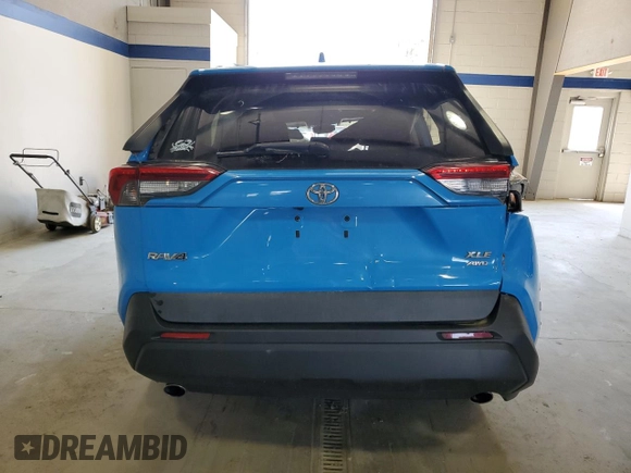 2019 Toyota RAV4 XLE with VIN 2T3P1RFV5KC009781, listed as a Copart auction lot 52262715 with Not Provided miles and Salvage Title. Bid and sale history available at DreamBid. Image 6.