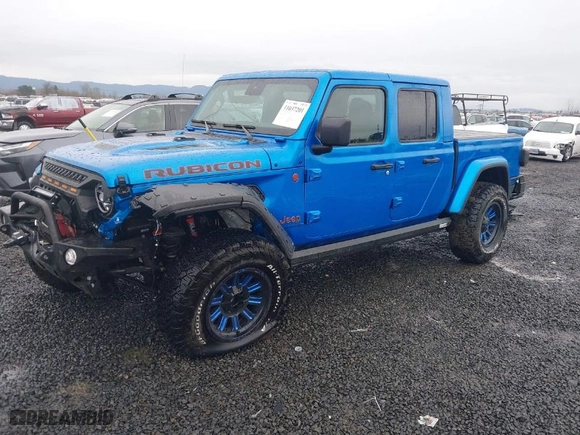 2022 Jeep Gladiator Rubicon with VIN 1C6JJTBM8NL144962, listed as a IAAI auction lot 41037201 with 12,063 mi miles. Bid and sale history available at carsss.com. Image 2.