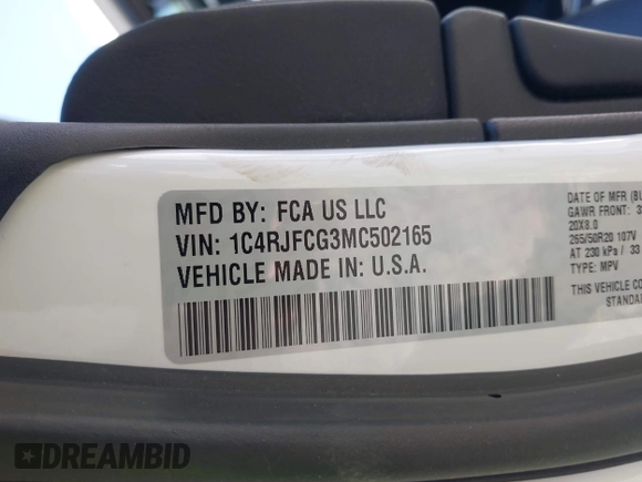 2021 Jeep Grand Cherokee Overland with VIN 1C4RJFCG3MC502165, listed as a IAAI auction lot 42404863 with 100,197 mi miles and . Bid and sale history available at DreamBid. Image 9.