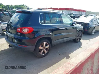 2010 Volkswagen Tiguan with VIN WVGAV9AX4AW513705, listed as a IAAI auction lot 42756432 with 212,980 mi miles and . Bid and sale history available at DreamBid. Image 4.