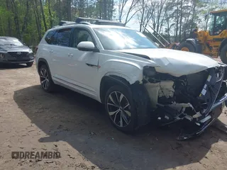 2024 Volkswagen Atlas SEL Premium R-Line with VIN 1V2FR2CA2RC617765, listed as a IAAI auction lot 41990546 with 15,098 mi miles and . Bid and sale history available at DreamBid. Image 1.