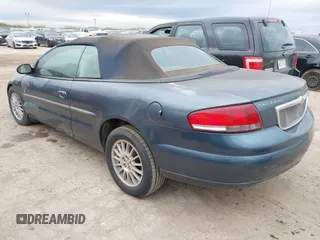 2002 Chrysler Sebring Limited with VIN 1C3EL65R72N201668, listed as a IAAI auction lot 41018612 with 143,931 mi miles and . Bid and sale history available at DreamBid. Image 3.