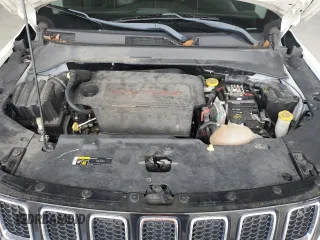2019 Jeep Compass Altitude with VIN 3C4NJCBB0KT637477, listed as a Copart auction lot 57751005 with 94,316 mi miles and Clean title. Bid and sale history available at DreamBid. Image 12.