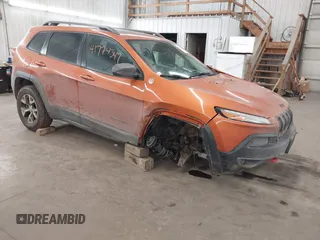 2015 Jeep Cherokee Trailhawk with VIN 1C4PJMBS5FW524462, listed as a IAAI auction lot 41774347 with 107,592 mi miles. Bid and sale history available at carsss.com. Image 1.