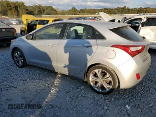 2013 Hyundai Elantra GT with VIN KMHD35LE7DU090495, listed as a Copart auction lot 77133264 with 118,660 mi miles and Salvage Title. Bid and sale history available at carsss.com. Image 2.