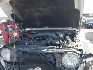 2018 Jeep Wrangler Unlimited Sport S с VIN 1C4HJXDG0JW205803, выставлен на аукционе IAAI как лот 41615097 с пробегом Не указан миль и . История ставок и продаж доступна на DreamBid. Изображение 10.