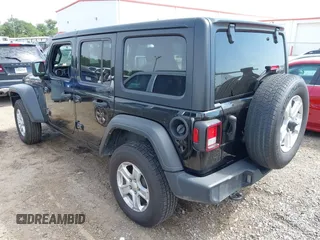 2023 Jeep Wrangler Sport S with VIN 1C4HJXDN6PW599895, listed as a IAAI auction lot 42242107 with 53,980 mi miles and . Bid and sale history available at DreamBid. Image 3.