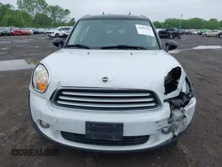 2013 MINI Countryman with VIN WMWZB3C53DWM08244, listed as a IAAI auction lot 42281364 with 139,894 mi miles and . Bid and sale history available at DreamBid. Image 12.