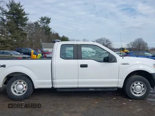 2019 Ford F-150 XL with VIN 1FTFX1E52KKD85097, listed as a IAAI auction lot 41479169 with 96,713 mi miles and . Bid and sale history available at DreamBid. Image 14.