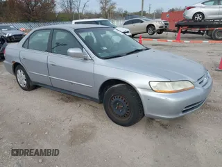 2001 Honda Accord LX z VIN 1HGCG56431A110313, wystawiony jako IAAI lot #40470299 z przebiegiem 181 034 mil mil oraz . Historia ofert i sprzedaży dostępna na DreamBid. Obrazek 1.