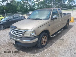 1999 Ford F-150 XL z VIN 1FTRX17LXXNB88516, wystawiony jako IAAI lot #42400493 z przebiegiem 254 085 mil mil oraz . Historia ofert i sprzedaży dostępna na DreamBid. Obrazek 6.